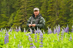 Eric in a meadow of lupines